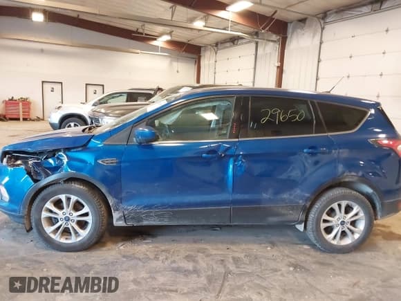 ✅ 2017 Ford Escape SE • VIN: 1FMCU0GD6HUB14787 • Lot: 43629650. Listed on IAAI with 143,286 mi. Free auction sales archive from the USA and detailed vehicle history report at DreamBid. Image 6.