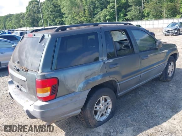 ✅ 2002 Jeep Grand Cherokee Laredo • VIN: 1J4GW48N32C266368 • Lot: 42439741. Listed on IAAI with 109,492 mi. Free auction sales archive from the USA and detailed vehicle history report at DreamBid. Image 4.