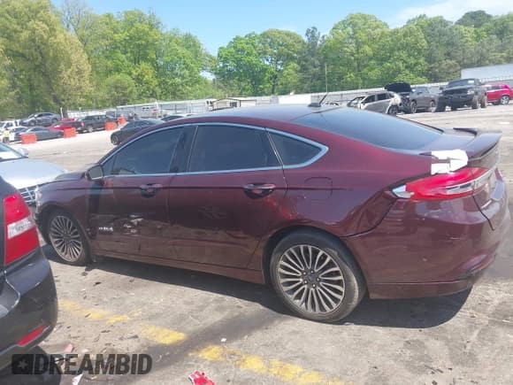 ✅ 2017 Ford Fusion Hybrid Titanium • VIN: 3FA6P0RU8HR321040 • Lot: 42041574. Listed on IAAI with 106,525 mi. Free auction sales archive from the USA and detailed vehicle history report at DreamBid. Image 14.
