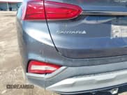 ✅ 2020 Hyundai Santa Fe Limited • VIN: 5NMS5CAA0LH208063 • Лот: 42131296. Опубликован ранее на IAAI с пробегом 65 030 миль. Бесплатный доступ к архиву аукционных продаж из США и подробный отчёт об истории автомобиля на DreamBid. Изображение 18.