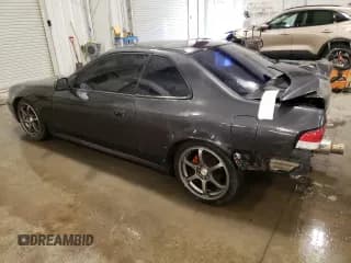 ✅ 1998 Honda Prelude • VIN: JHMBB6243WC015779 • Лот: 42591465. Опубликован ранее на Copart с пробегом 145 532 миль. Бесплатный доступ к архиву аукционных продаж из США и подробный отчёт об истории автомобиля на DreamBid. Изображение 2.