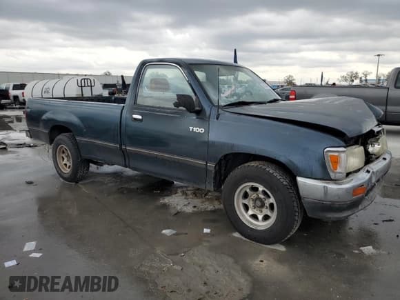 ✅ 1994 Toyota T100 DX • VIN: JT4VD10A6R0017701 • Lot: 46034975. Listed on Copart with 219,651 mi. Free auction sales archive from the USA and detailed vehicle history report at DreamBid. Image 4.