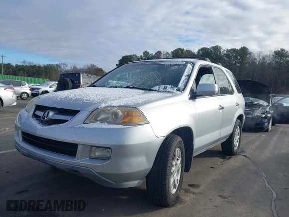 ✅ 2006 Acura MDX Touring • VIN: 2HNYD18666H545799 • Lot: 43827575. Listed on IAAI with 216,994 mi. Free auction sales archive from the USA and detailed vehicle history report at DreamBid. Image 2.