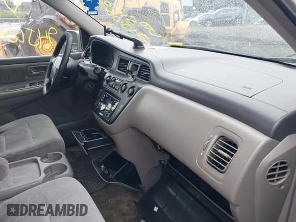 ✅ 2003 Honda Odyssey EX • VIN: 5FNRL18623B051129 • Lot: 40065538. Listed on IAAI with Not provided. Free auction sales archive from the USA and detailed vehicle history report at DreamBid. Image 5.