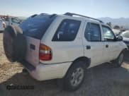 ✅ 1999 Isuzu Rodeo S • VIN: 4S2CM58W0X4306727 • Lot: 74758994. Listed on Copart with 193,850 mi. Free auction sales archive from the USA and detailed vehicle history report at DreamBid. Image 3.