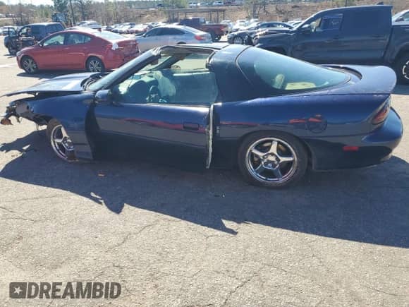 2002 Chevrolet Camaro Z28 с VIN 2G1FP22G722137152, выставлен на аукционе Copart как лот 48016845 с пробегом Не указан миль и Списание • Salvage title. История ставок и продаж доступна на DreamBid. Изображение 2.