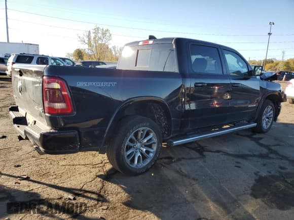 ✅ 2022 Ram 1500 Laramie • VIN: 1C6SRFJT0NN455975 • Lot: 86813865. Listed on Copart with 36,750 mi. Free auction sales archive from the USA and detailed vehicle history report at DreamBid. Image 3.