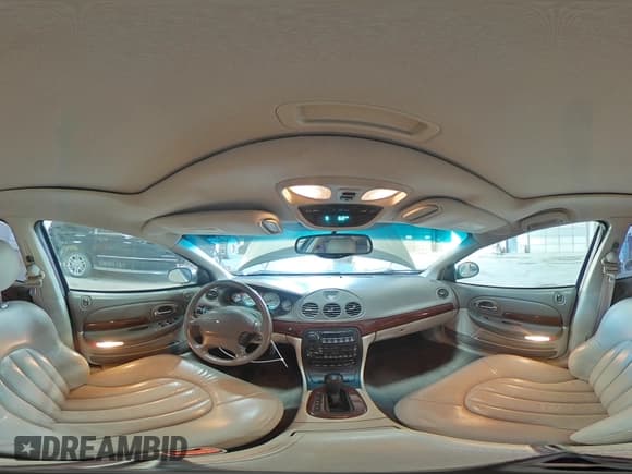 ✅ 2001 Chrysler LHS • VIN: 2C3HC56G61H659519 • Lot: 48898595. Listed on Copart with 124,966 mi. Free auction sales archive from the USA and detailed vehicle history report at DreamBid. Image 12.