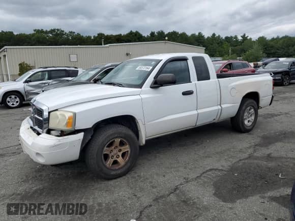 2006 Dodge Dakota SLT с VIN 1D7HW42N86S583549, выставлен на аукционе Copart как лот 69373164 с пробегом 194 509 миль миль и Списание • Salvage title. История ставок и продаж доступна на DreamBid. Изображение 1.