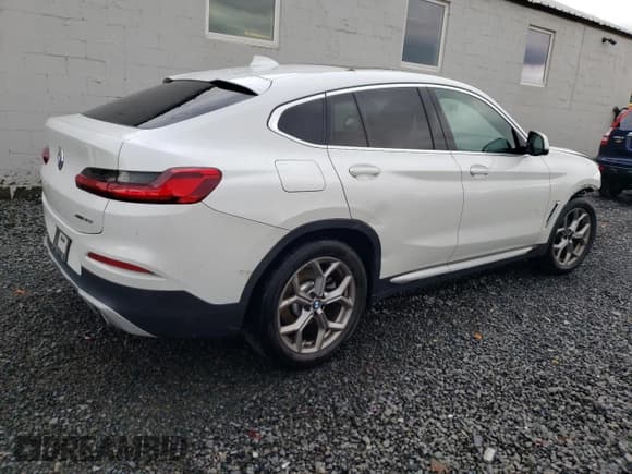 ✅ 2021 BMW X4 xDrive30i • VIN: 5UX2V1C05M9F95703 • Lot: 91612905. Listed on Copart with 55,581 mi. Free auction sales archive from the USA and detailed vehicle history report at DreamBid. Image 3.