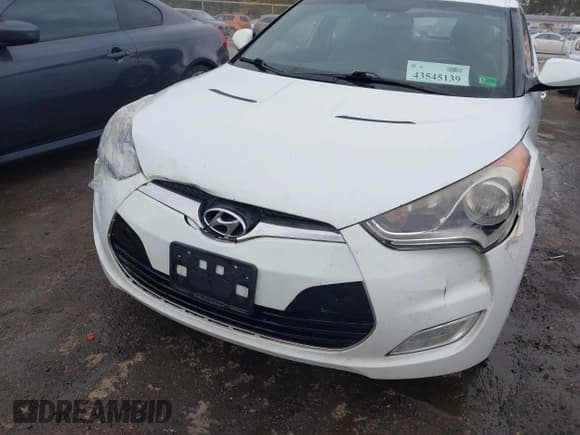 ✅ 2013 Hyundai Veloster w/Black Int • VIN: KMHTC6AD9DU145590 • Lot: 43545139. Wystawiony na IAAI z przebiegiem 155 729 mil. Bezpłatny archiwum sprzedaży aukcyjnych z USA i szczegółowy raport historii pojazdu na DreamBid. Zdjęcie 6.