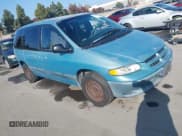 ✅ 1999 Dodge Caravan SE • VIN: 2B4GP45R3XR435259 • Lot: 43821383. Listed on IAAI with 112,156 mi. Free auction sales archive from the USA and detailed vehicle history report at DreamBid. Image 1.