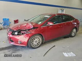 ✅ 2014 Ford Focus Titanium • VIN: 1FADP3J21EL104555 • Lot: 94119355. Listed on Copart with 172,273 mi. Free auction sales archive from the USA and detailed vehicle history report at DreamBid. Image 1.
