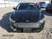 ✅ 2017 Ford Fusion Hybrid Titanium • VIN: 3FA6P0RU8HR113952 • Lot: 89856085. Wystawiony na Copart z przebiegiem Nie podano. Bezpłatny archiwum sprzedaży aukcyjnych z USA i szczegółowy raport historii pojazdu na DreamBid. Zdjęcie 5.