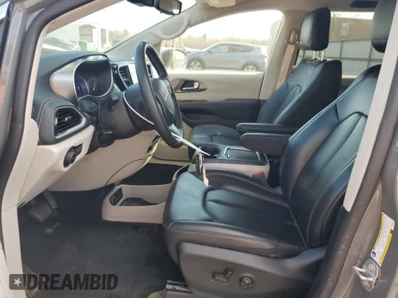 ✅ 2023 Chrysler Pacifica Hybrid Touring L • VIN: 2C4RC1L72PR618529 • Lot: 46994375. Listed on Copart with 59,006 mi. Free auction sales archive from the USA and detailed vehicle history report at DreamBid. Image 7.