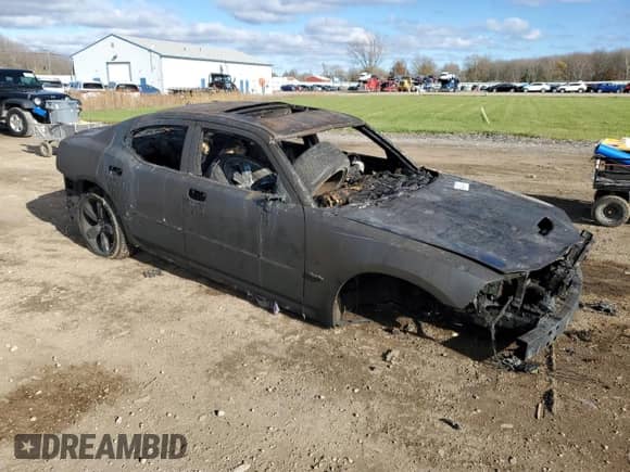 2007 Dodge Charger SRT-8 с VIN 2B3LA73W17H894603, выставлен на аукционе Copart как лот 80543024 с пробегом Не указан миль и На запчасти • Non repairable. История ставок и продаж доступна на DreamBid. Изображение 4.