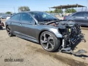 ✅ 2022 Audi RS 5 Sportback • VIN: WUAAWCF52NA901057 • Lot: 62050164. Listed on Copart with 22,175 mi. Free auction sales archive from the USA and detailed vehicle history report at DreamBid. Image 4.