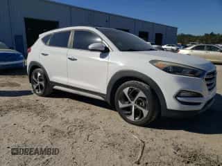 2018 Hyundai Tucson Value z VIN KM8J33A22JU645218, wystawiony jako Copart lot #90871735 z przebiegiem 137 400 mil mil oraz Czysty tytuł • Clean title. Historia ofert i sprzedaży dostępna na DreamBid. Obrazek 4.