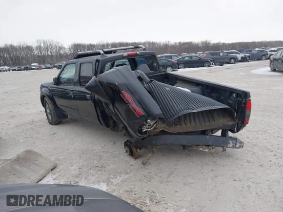 ✅ 2002 Nissan Frontier SE • VIN: 1N6ED29Y32C366211 • Lot: 41250598. Listed on IAAI with 135,280 mi. Free auction sales archive from the USA and detailed vehicle history report at DreamBid. Image 3.