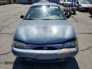 ✅ 1999 Ford Escort LX • VIN: 1FAFP10P4XW112449 • Lot: 67313405. Listed on Copart with 134,715 mi. Free auction sales archive from the USA and detailed vehicle history report at DreamBid. Image 5.