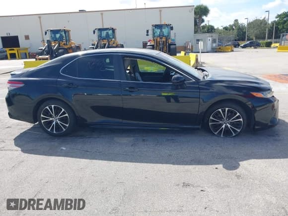 ✅ 2018 Toyota Camry LE • VIN: 4T1B11HK5JU662437 • Lot: 43568869. Listed on IAAI with 118,750 mi. Free auction sales archive from the USA and detailed vehicle history report at DreamBid. Image 13.