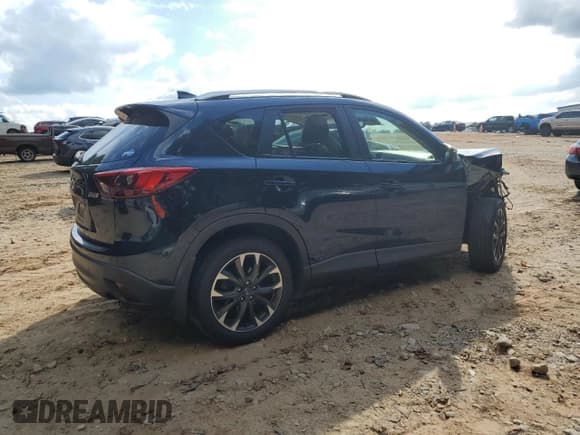 ✅ 2016 Mazda CX-5 Grand Touring • VIN: JM3KE2DY9G0806751 • Lot: 82260835. Listed on Copart with 144,275 mi. Free auction sales archive from the USA and detailed vehicle history report at DreamBid. Image 3.