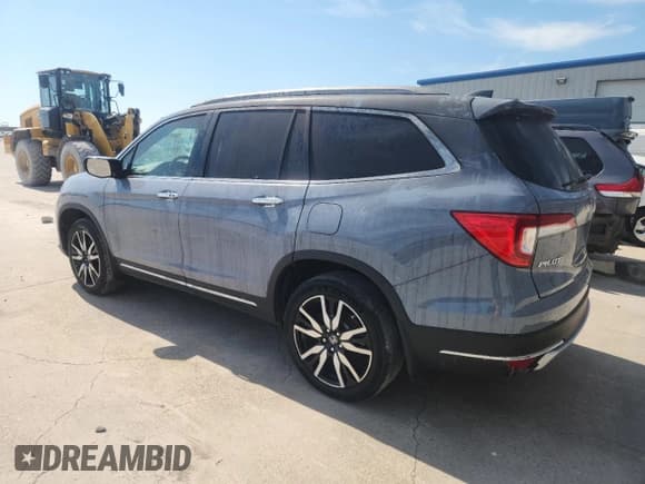 ✅ 2022 Honda Pilot Touring 7-Passenger • VIN: 5FNYF6H68NB077916 • Lot: 84418935. Listed on Copart with 24,400 mi. Free auction sales archive from the USA and detailed vehicle history report at DreamBid. Image 2.