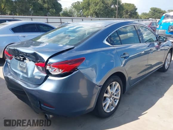 ✅ 2015 Mazda 6 i Sport • VIN: JM1GJ1U50F1191106 • Lot: 42887870. Listed on IAAI with 127,167 mi. Free auction sales archive from the USA and detailed vehicle history report at DreamBid. Image 4.