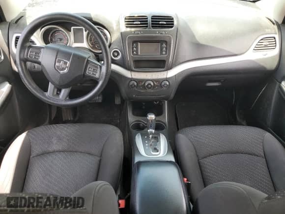 2017 Dodge Journey SE with VIN 3C4PDCAB8HT606195, listed as a Copart auction lot 60147455 with 125,120 mi miles and Salvage title. Bid and sale history available at DreamBid. Image 8.