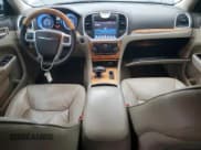 ✅ 2014 Chrysler 300 C • VIN: 2C3CCAKG5EH253102 • Лот: 90117035. Опубликован ранее на Copart с пробегом 146 877 миль. Бесплатный доступ к архиву аукционных продаж из США и подробный отчёт об истории автомобиля на DreamBid. Изображение 8.