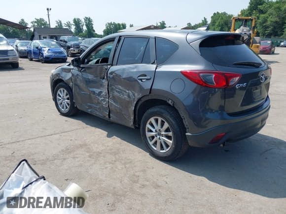 ✅ 2016 Mazda CX-5 Sport • VIN: JM3KE2BE0G0857015 • Lot: 42471734. Listed on IAAI with 81,401 mi. Free auction sales archive from the USA and detailed vehicle history report at DreamBid. Image 3.