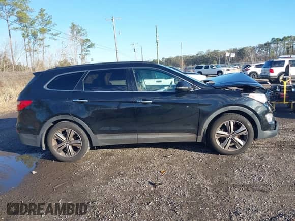 2015 Hyundai Santa Fe Limited with VIN KM8SR4HF4FU100632, listed as a IAAI auction lot 41339216 with 197,985 mi miles and . Bid and sale history available at DreamBid. Image 13.