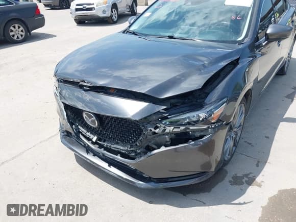 ✅ 2021 Mazda 6 Grand Touring • VIN: JM1GL1TYXM1615684 • Lot: 42690667. Listed on IAAI with 86,360 mi. Free auction sales archive from the USA and detailed vehicle history report at DreamBid. Image 6.