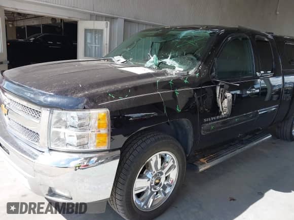 2013 Chevrolet Silverado 1500 LT with VIN 1GCRCSE02DZ272960, listed as a IAAI auction lot 43469383 with 77,796 mi miles and . Bid and sale history available at DreamBid. Image 6.