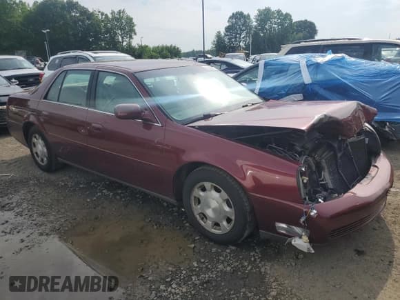 ✅ 2001 Cadillac DeVille • VIN: 1G6KD54Y51U268534 • Lot: 60542015. Listed on Copart with 100,712 mi. Free auction sales archive from the USA and detailed vehicle history report at DreamBid. Image 4.