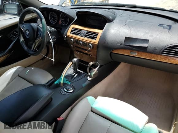 ✅ 2006 BMW 6 Series 650Ci • VIN: WBAEK13496CN75657 • Lot: 61015785. Wystawiony na Copart z przebiegiem 106 288 mil. Bezpłatny archiwum sprzedaży aukcyjnych z USA i szczegółowy raport historii pojazdu na DreamBid. Zdjęcie 8.