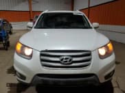 ✅ 2012 Hyundai Santa Fe GLS • VIN: 5XYZGDAG6CG113424 • Lot: 84898144. Listed on Copart with 140,697 mi. Free auction sales archive from the USA and detailed vehicle history report at DreamBid. Image 5.