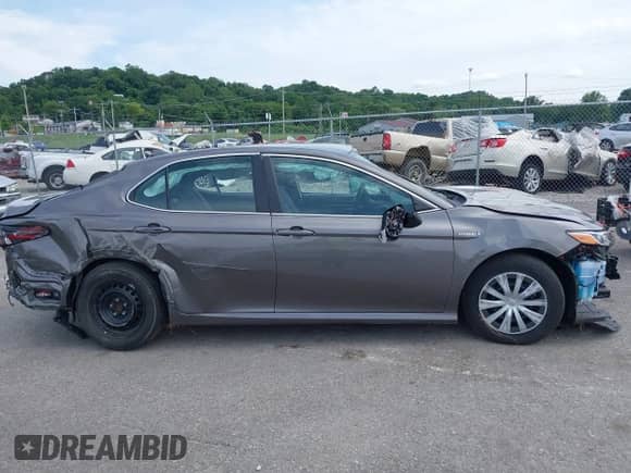 2021 Toyota Camry Hybrid LE с VIN 4T1C31AK7MU551305, выставлен на аукционе IAAI как лот 39548351 с пробегом Не указан миль и . История ставок и продаж доступна на DreamBid. Изображение 13.