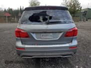 ✅ 2014 Mercedes-Benz GL 450 • VIN: 4JGDF7CEXEA327454 • Lot: 91580015. Listed on Copart with 97,665 mi. Free auction sales archive from the USA and detailed vehicle history report at DreamBid. Image 6.