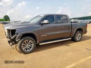 2020 Ram 1500 Laramie с VIN 1C6RREJT6LN100718, выставлен на аукционе Copart как лот 59289735 с пробегом 120 460 миль миль и Списание • Salvage title. История ставок и продаж доступна на DreamBid. Изображение 1.