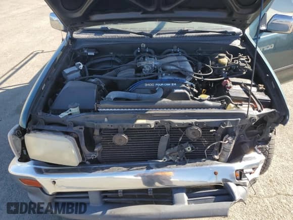 ✅ 1998 Toyota T100 SR5 • VIN: JT4TN14D4W0041404 • Lot: 45799435. Wystawiony na Copart z przebiegiem 340 047 mil. Bezpłatny archiwum sprzedaży aukcyjnych z USA i szczegółowy raport historii pojazdu na DreamBid. Zdjęcie 11.