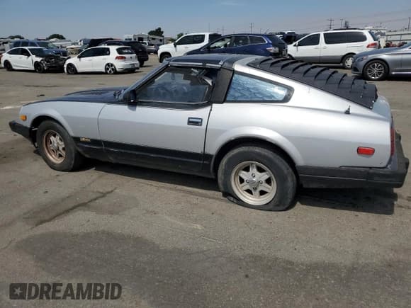 ✅ 1982 Datsun 280ZX • VIN: JN1HZ04SXCX448748 • Лот: 87670125. Опубликован ранее на Copart с пробегом 136 264 миль. Бесплатный доступ к архиву аукционных продаж из США и подробный отчёт об истории автомобиля на DreamBid. Изображение 2.