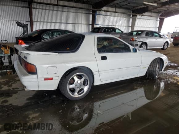 ✅ 1986 Mazda RX-7 • VIN: JM1FC3311G0117703 • Lot: 85537314. Listed on Copart with 121,833 mi. Free auction sales archive from the USA and detailed vehicle history report at DreamBid. Image 3.