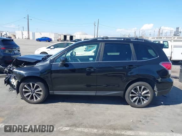2017 Subaru Forester Premium with VIN JF2SJGEC8HH808466, listed as a IAAI auction lot 43250728 with 147,399 mi miles and . Bid and sale history available at DreamBid. Image 15.