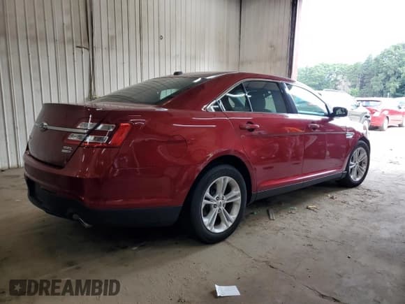 ✅ 2014 Ford Taurus SEL • VIN: 1FAHP2H85EG126945 • Lot: 69673325. Listed on Copart with 77,305 mi. Free auction sales archive from the USA and detailed vehicle history report at DreamBid. Image 3.