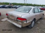 ✅ 1996 Toyota Avalon XL • VIN: 4T1BF12B3TU066076 • Lot: 43339780. Listed on IAAI with 124,943 mi. Free auction sales archive from the USA and detailed vehicle history report at DreamBid. Image 4.