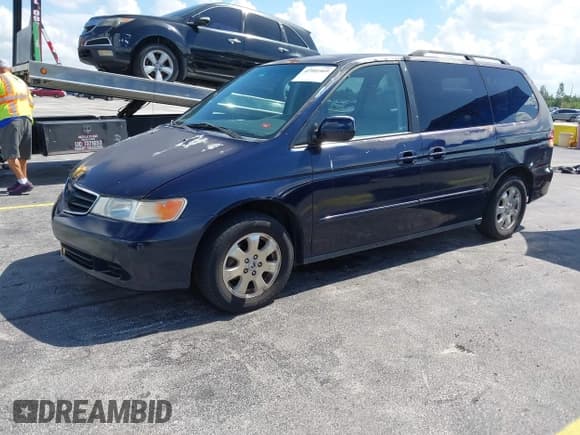 ✅ 2003 Honda Odyssey EX-L • VIN: 5FNRL18933B097434 • Lot: 42901469. Wystawiony na IAAI z przebiegiem 142 899 mil. Bezpłatny archiwum sprzedaży aukcyjnych z USA i szczegółowy raport historii pojazdu na DreamBid. Zdjęcie 2.
