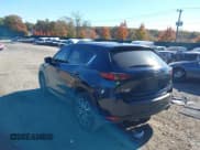 ✅ 2018 Mazda CX-5 Grand Touring • VIN: JM3KFBDM6J0473734 • Лот: 43536049. Опубликован ранее на IAAI с пробегом 124 488 миль. Бесплатный доступ к архиву аукционных продаж из США и подробный отчёт об истории автомобиля на DreamBid. Изображение 3.