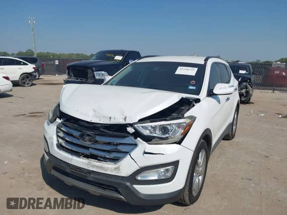 2014 Hyundai Santa Fe with VIN 5XYZU3LA7EG183450, listed as a IAAI auction lot 43218232 with 102,132 mi miles and . Bid and sale history available at DreamBid. Image 17.