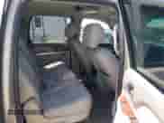 2014 Chevrolet Suburban LT z VIN 1GNSCJE05ER117100, wystawiony jako IAAI lot #42624986 z przebiegiem 198 729 mil mil oraz . Historia ofert i sprzedaży dostępna na DreamBid. Obrazek 8.